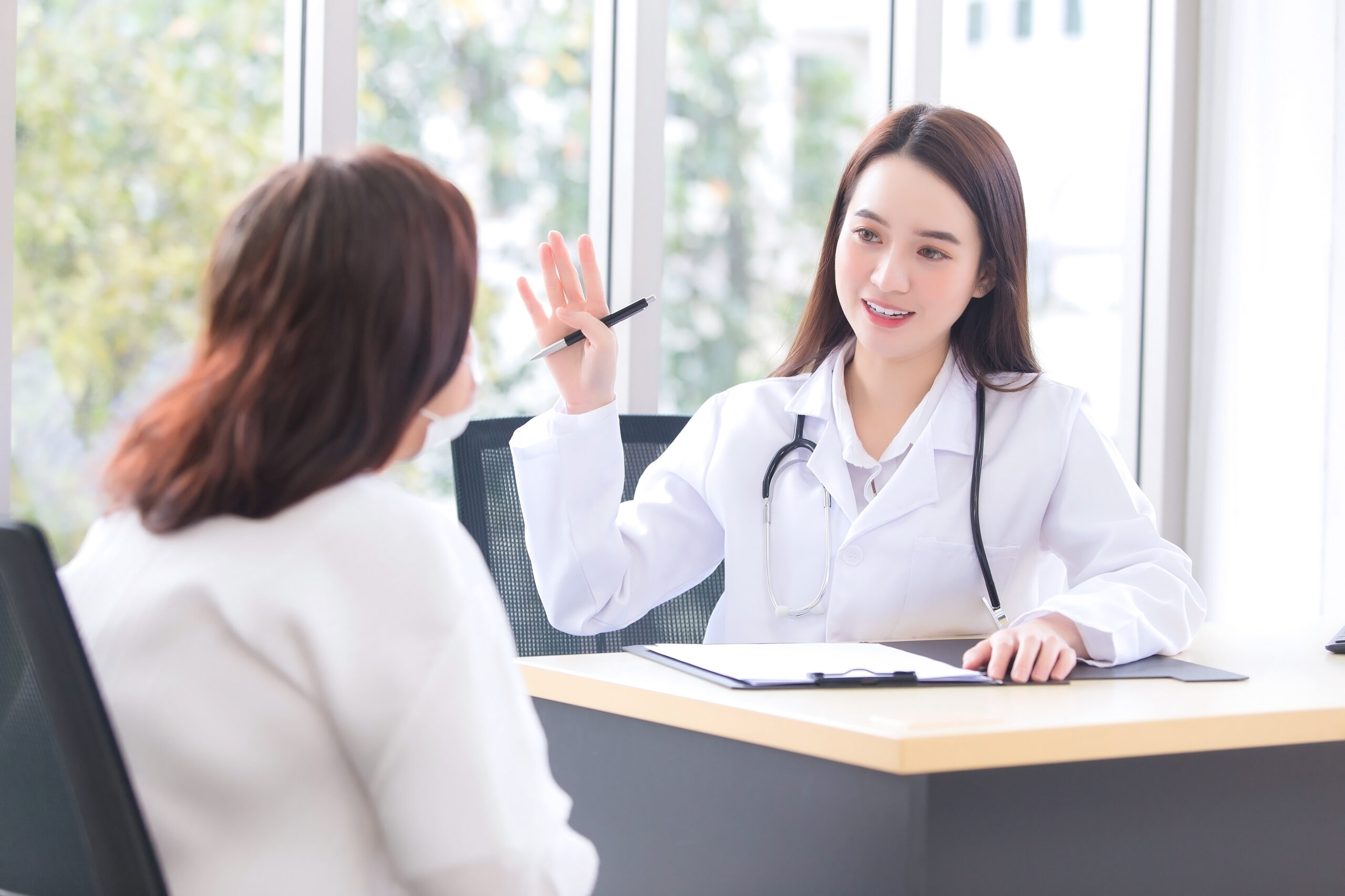 MTF Bottom Surgery Cost: Full Breakdown for 2026 1 asian doctor woman who wears medical coat talks with woman patient elderly suggest treatment scaled