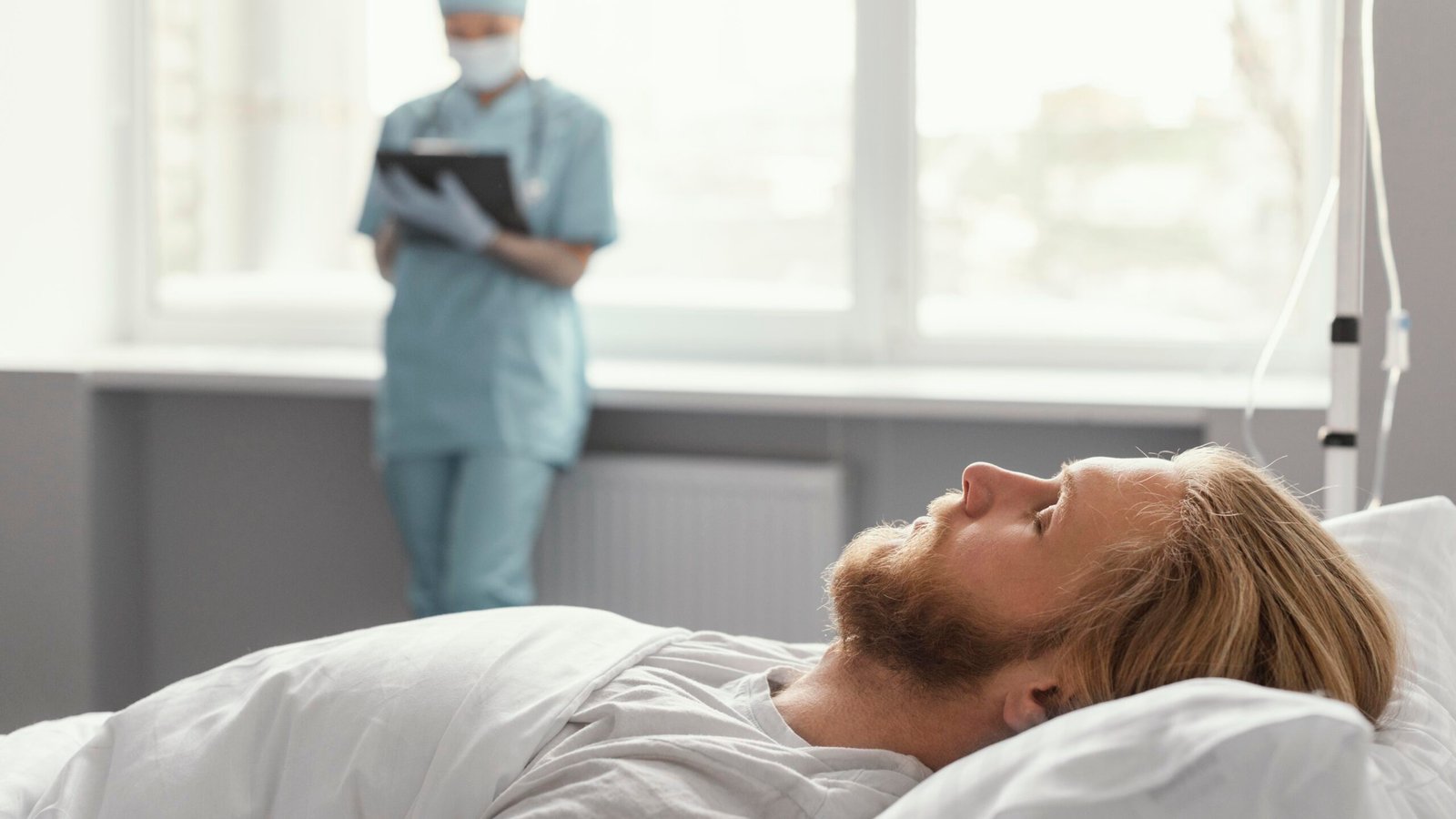 close up health worker supervising patient scaled