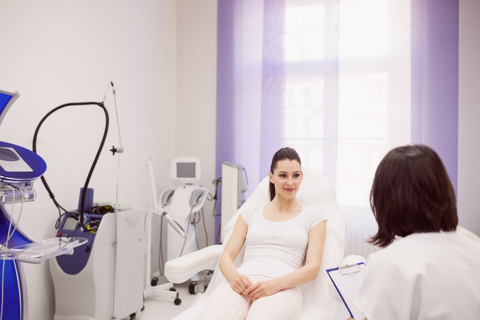 Vaginoplasty Dilation: The Complete Guide and Schedule 2 dermatologist female patient interacting with each other scaled