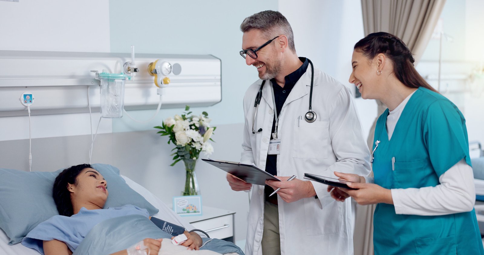 Vaginoplasty Complications and Risks: A Clinical Overview 3 woman doctor nurse hospital clinic recovery wellness healthcare treatment female person patient medical staff with record diagnosis results support advice scaled