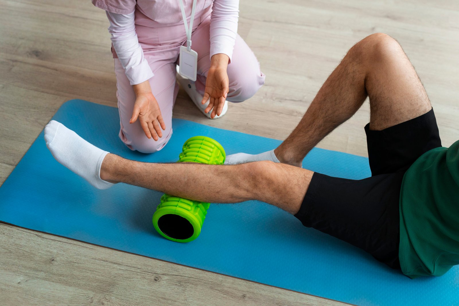 doctor helping patient rehabilitation scaled