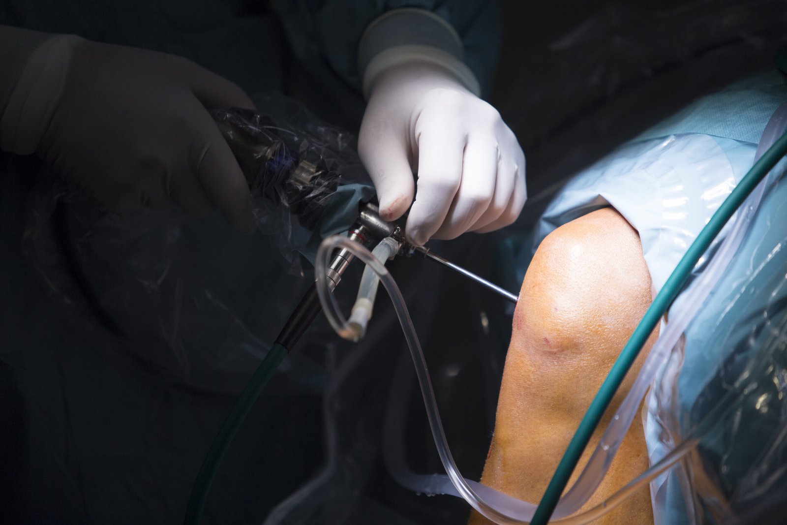 midsection doctor doing surgery patient hospital scaled