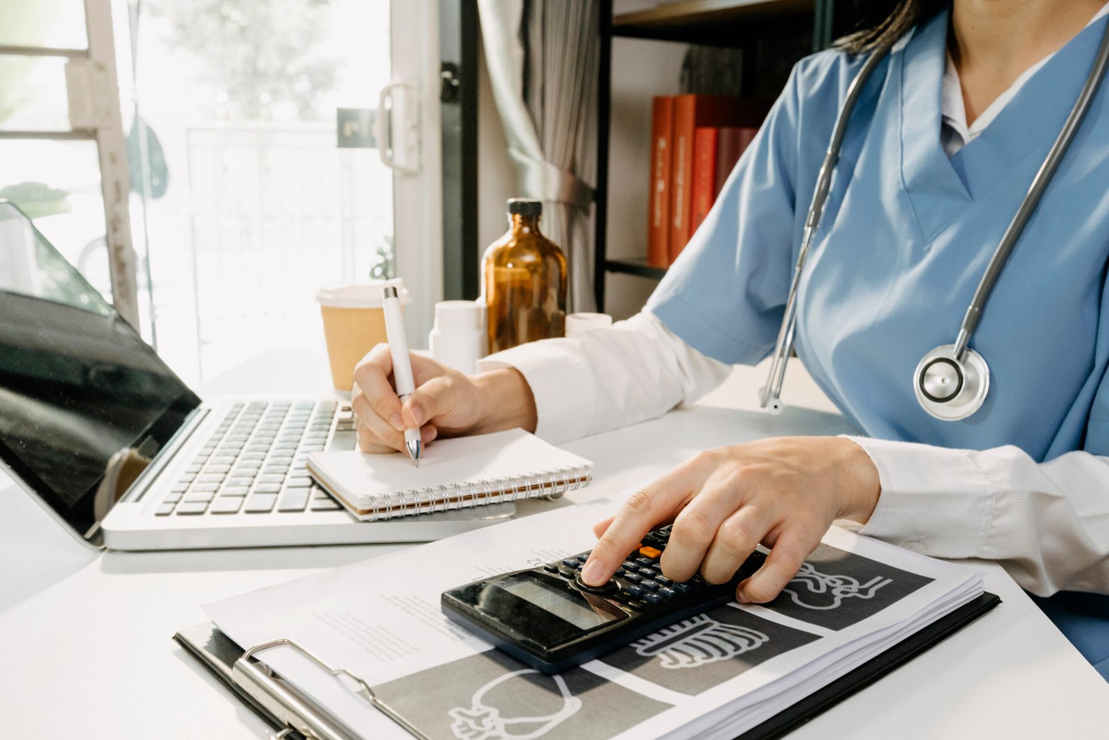 How Much Does a Knee Replacement Cost in Australia? (2026 Guide) 1 midsection man using laptop table scaled