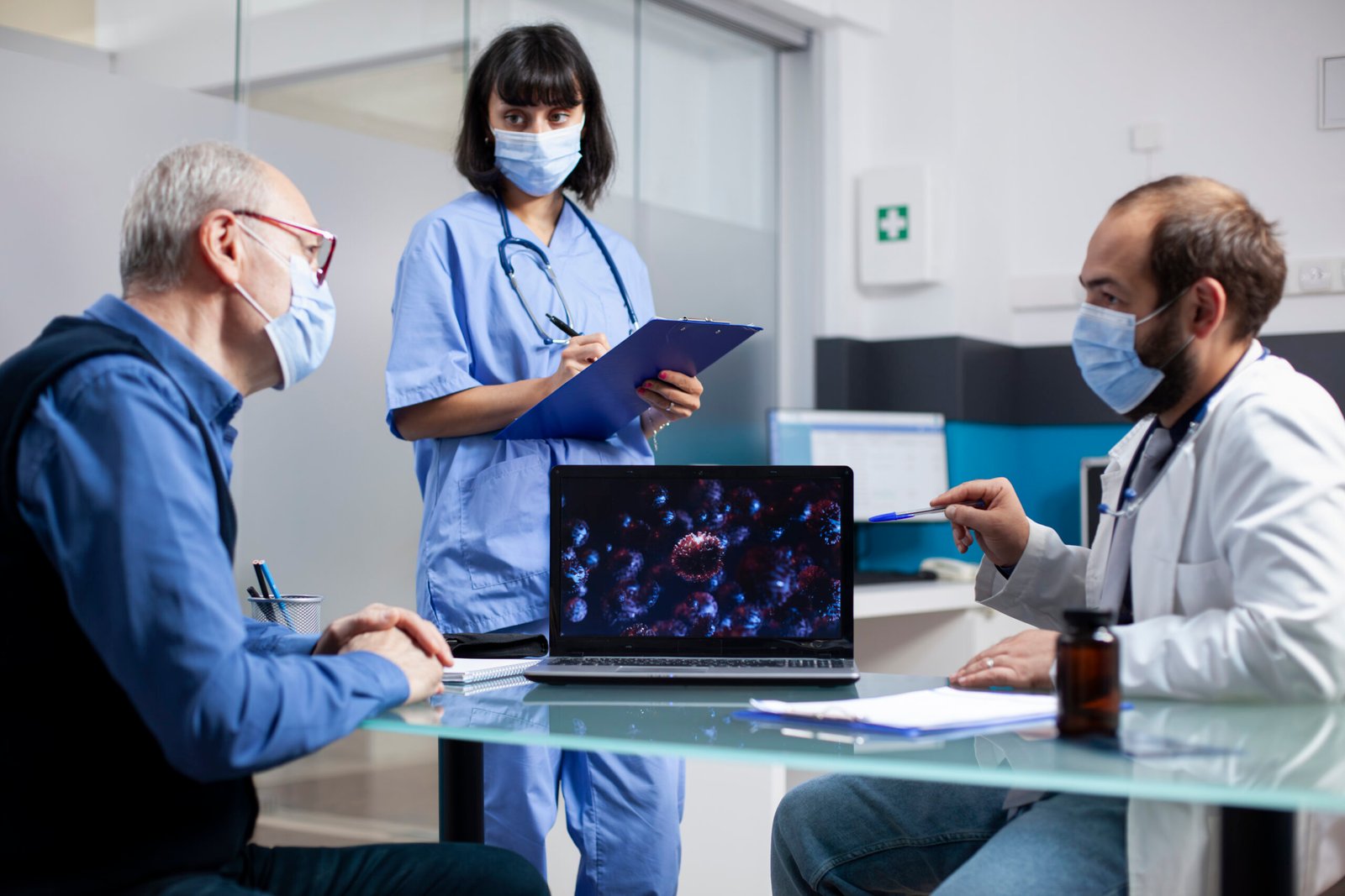 medic team discussing germs clinic scaled