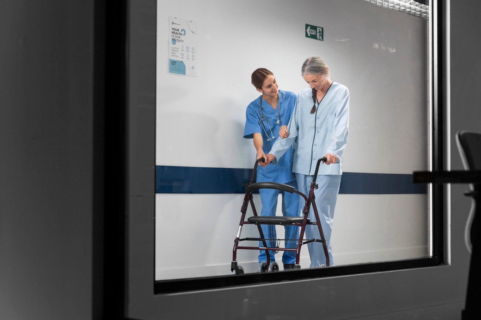 nurse helping patient walk scaled