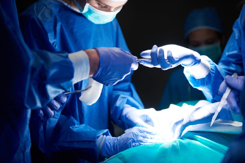 How Long Does Knee Replacement Surgery Take? A Step by Step Timeline 7 surgeons passing scissors each other