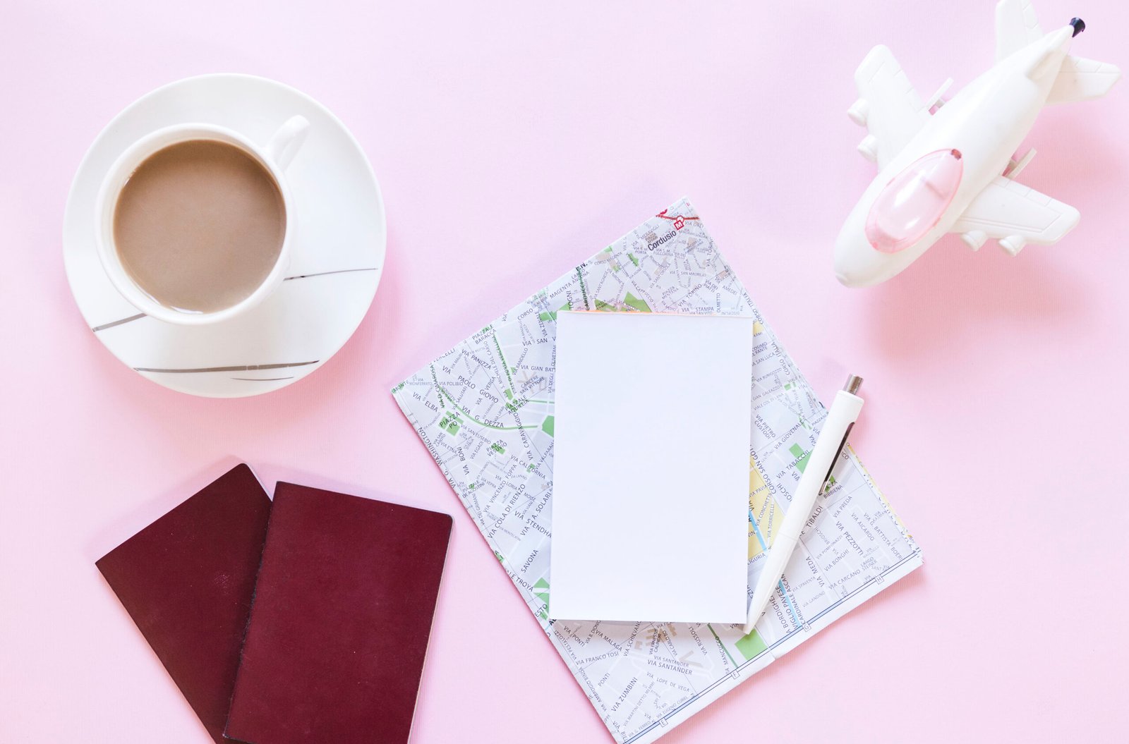 Knee Replacement Without Private Health Insurance in Australia: Your Options and What Each Costs 2 cup-tea-passport-map-paper-pen-airplane-pink-backdrop