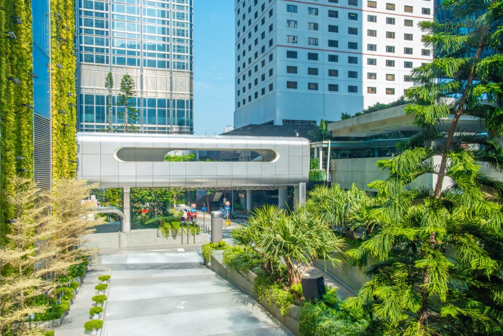 futuristic-elevated-walkway-with-surrounding-greenery-modern-buildings-hong-kong-city-china